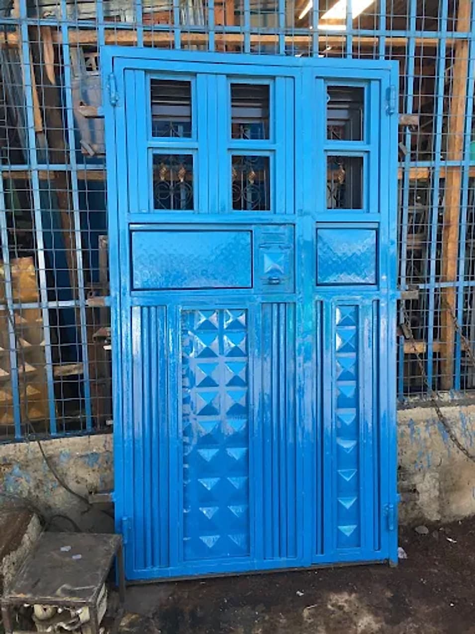 Blue Double Door with Studded Panels