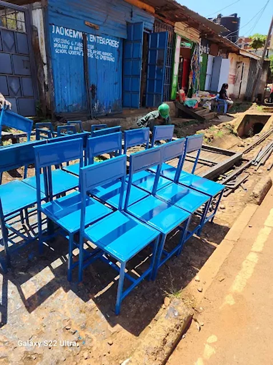 Blue School Desks Outside the Workshop