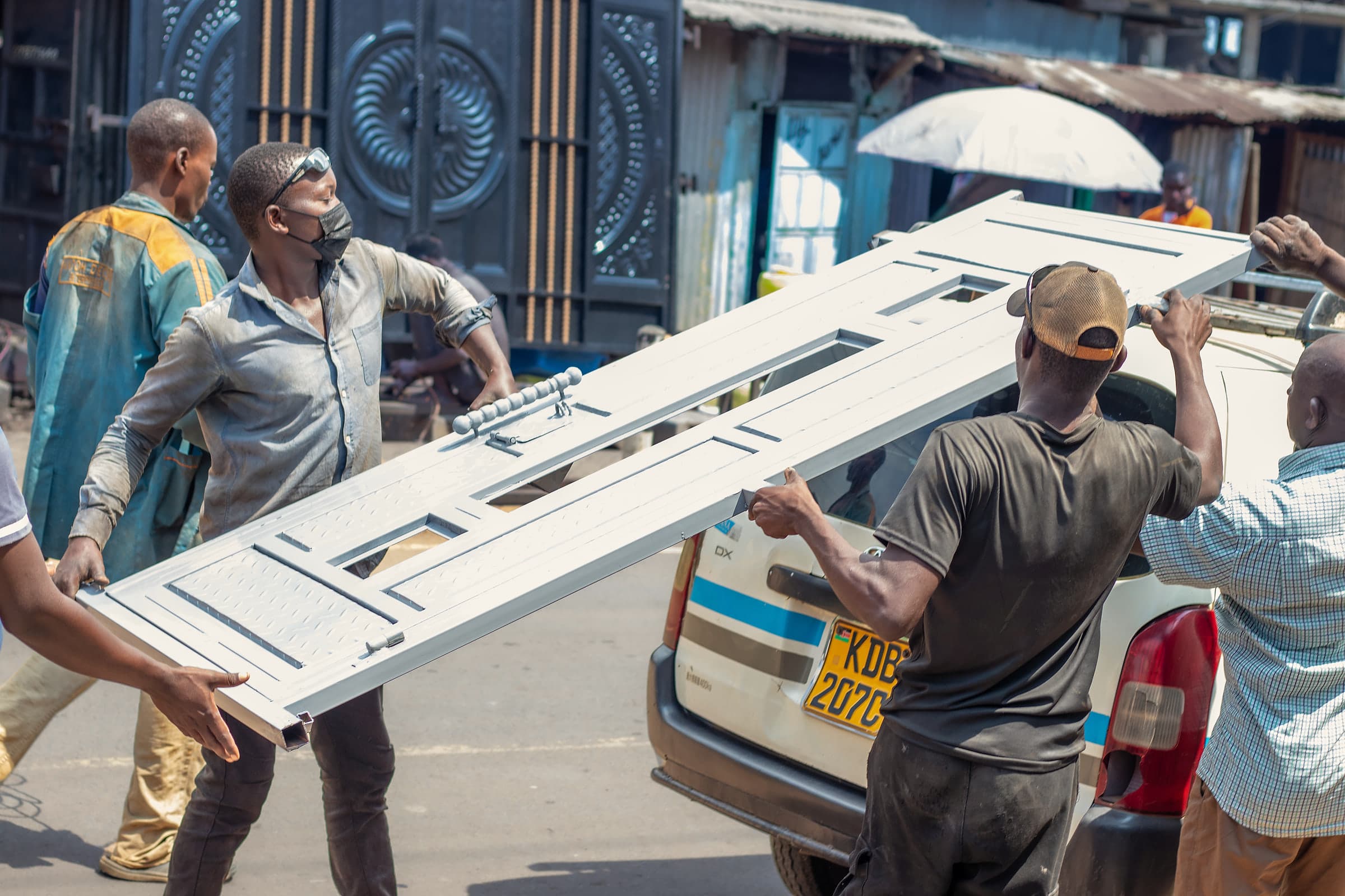 Carrying a Finished Door to the Van